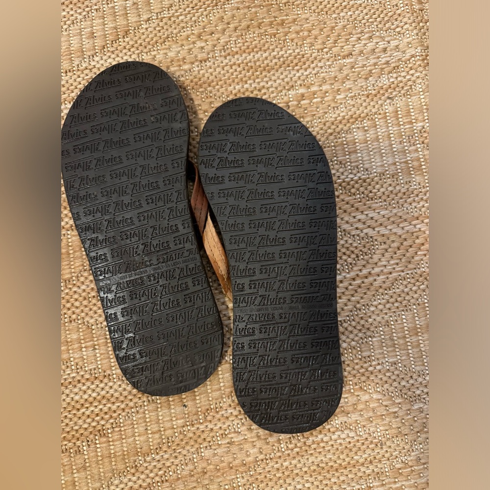 Alvies tan flip flops
